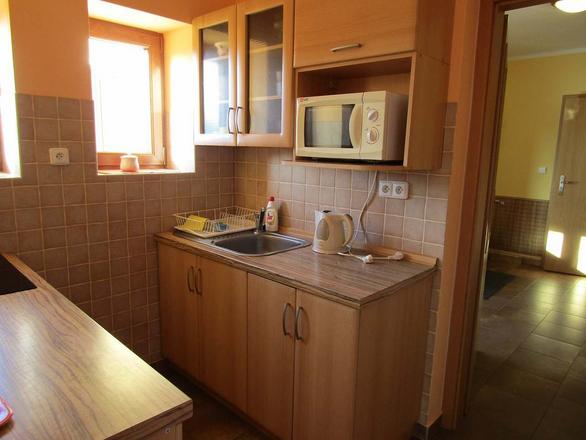 apartm&aacute;n TŘI kuchyň